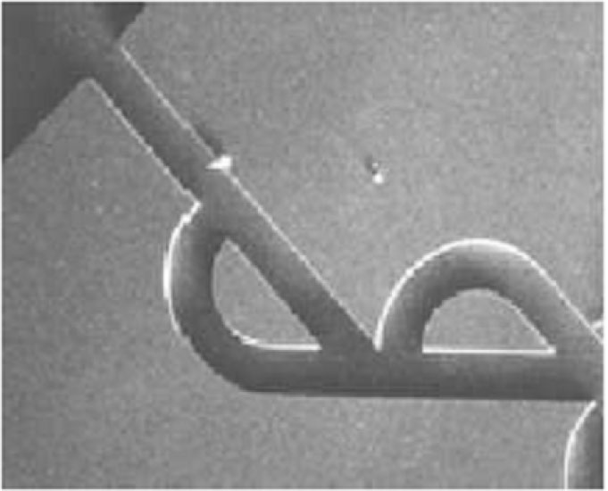 Fig. 1 
A rotated scanning electron microscope photograph of a Tesla valve by Forster et al. [8]

