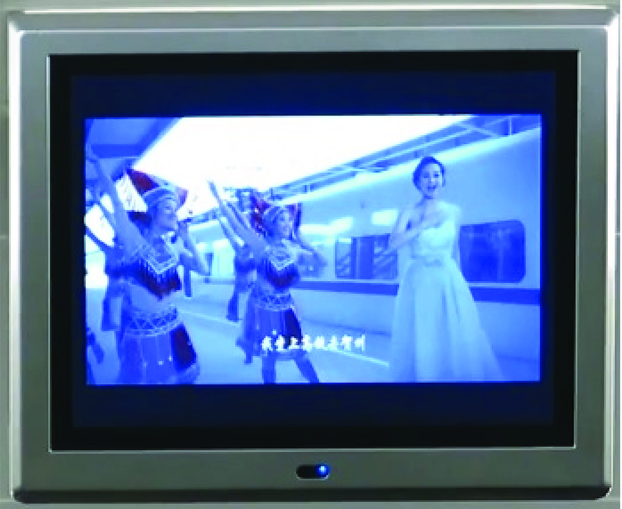 Figure 9: Singers at a high-speed platform in exotic costumes, 2015 GAT video.