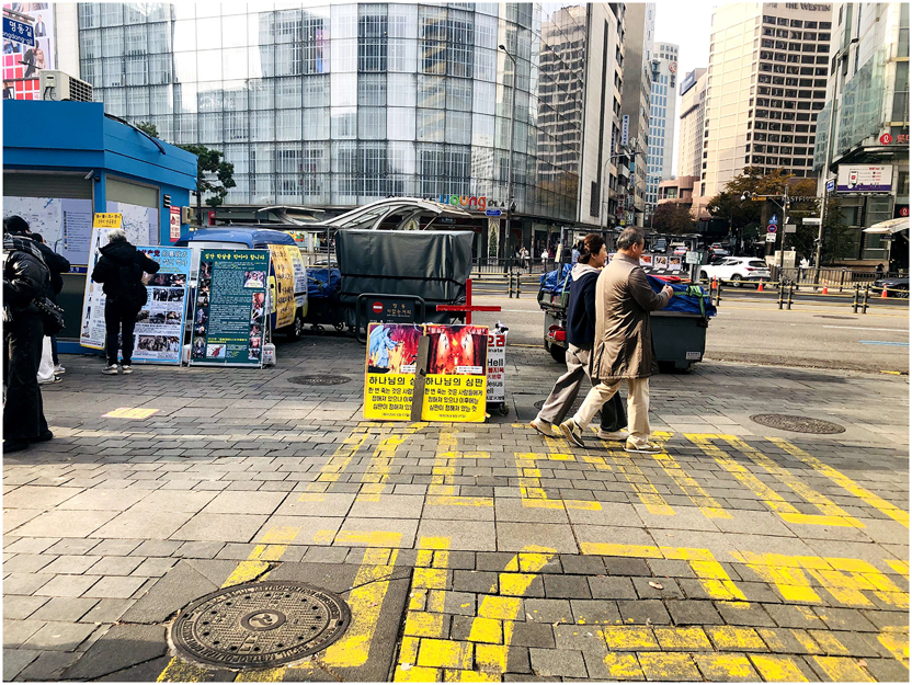 Photo 5: 
View of an evangelical preaching booth in Myeongdong, Seoul. © Adrian Gasser, December 2024.
