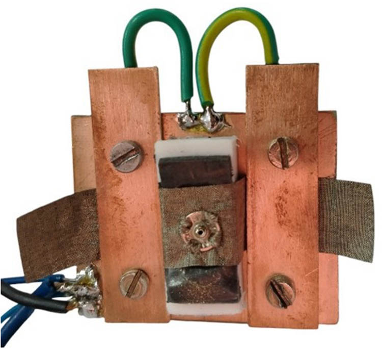 Figure 7
Mounting holders with the sample mounted.