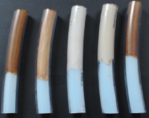 Figure 3 Coated model catheters: Five different coatings were applied on a rigid PTFE tube. After drying, the PTFE tube has been covered with a flexible PVC tube to protect the coating.