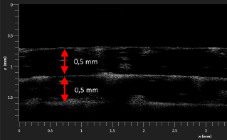 Figure 6 OCT plot, highlighting titanium-oxide in between layers, confirming a layer thickness of 0.8 mm.