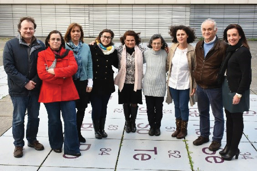 The Portuguese team standing on the periodic table at DQB-FCUL. From left to right: Antonio Ferreira, Marta Sousa Silva (FCUL), Helena Soares da Costa (INSA), Amelia Pilar Rauter, Antonia Turkman, Marília Antunes, Feridun Turkman (FCUL), and Tania Albuquerque (INSA). Absent: Alice Martins