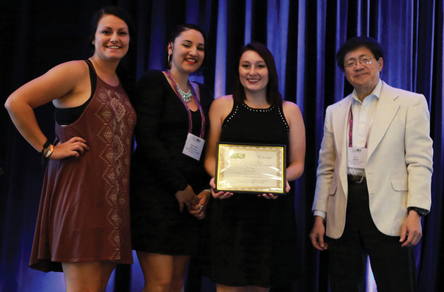 From left: Victoria Smith, Angelika Trujillo, and Jessica Causey, Lindenwood University, with H.N. Cheng, USDA, presenting a Poster Award
