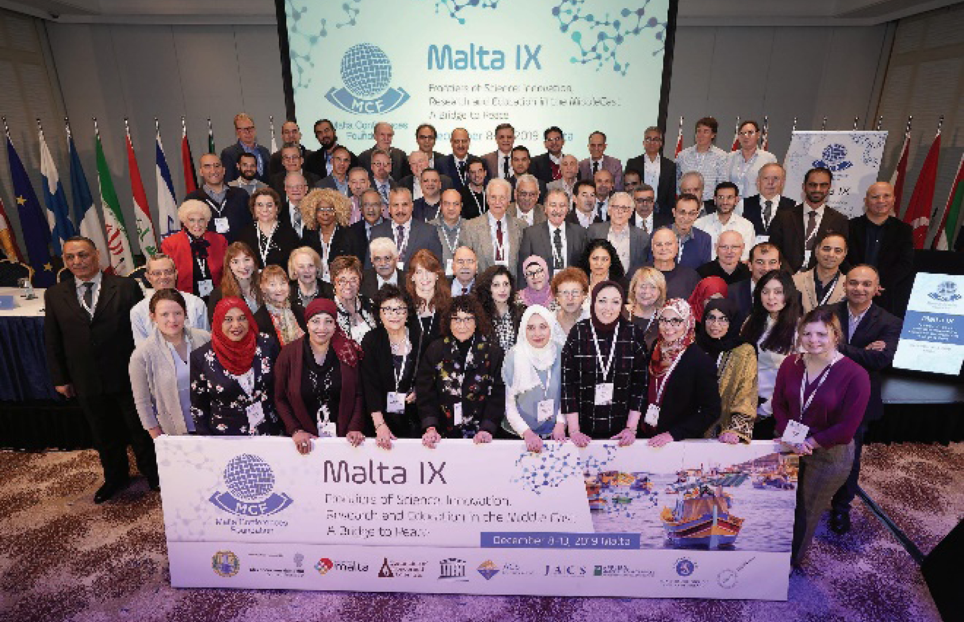  
          
            Participants attending the IX Malta conference in 2019.
          
        