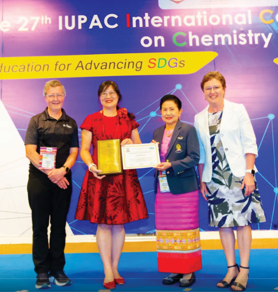  
          Mei-Hung Chiu (2nd from left) received 2024 Distinguished Contribution to Chemistry Education Lifetime Award from Peter Mahaffy and Supawan Tantayanon, both former awardees, and witnessed by Marietjie Potgieter, Chair of the IUPAC Committee on Chemistry Education (CCE).
        