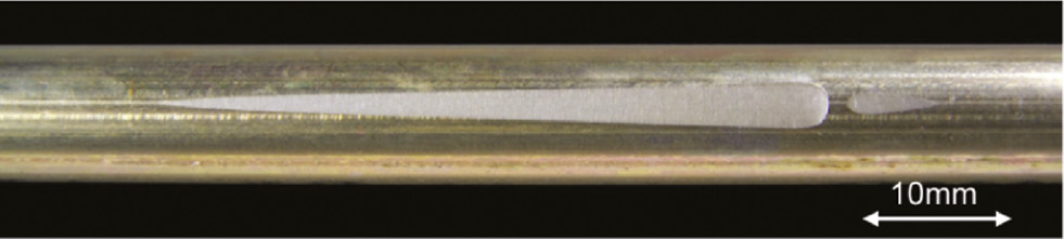 Figure 11: 
						Friction marks on the outside of heat exchanger tubes.
						Reprinted from Klein et al. (2014), with permission from Elsevier.
					