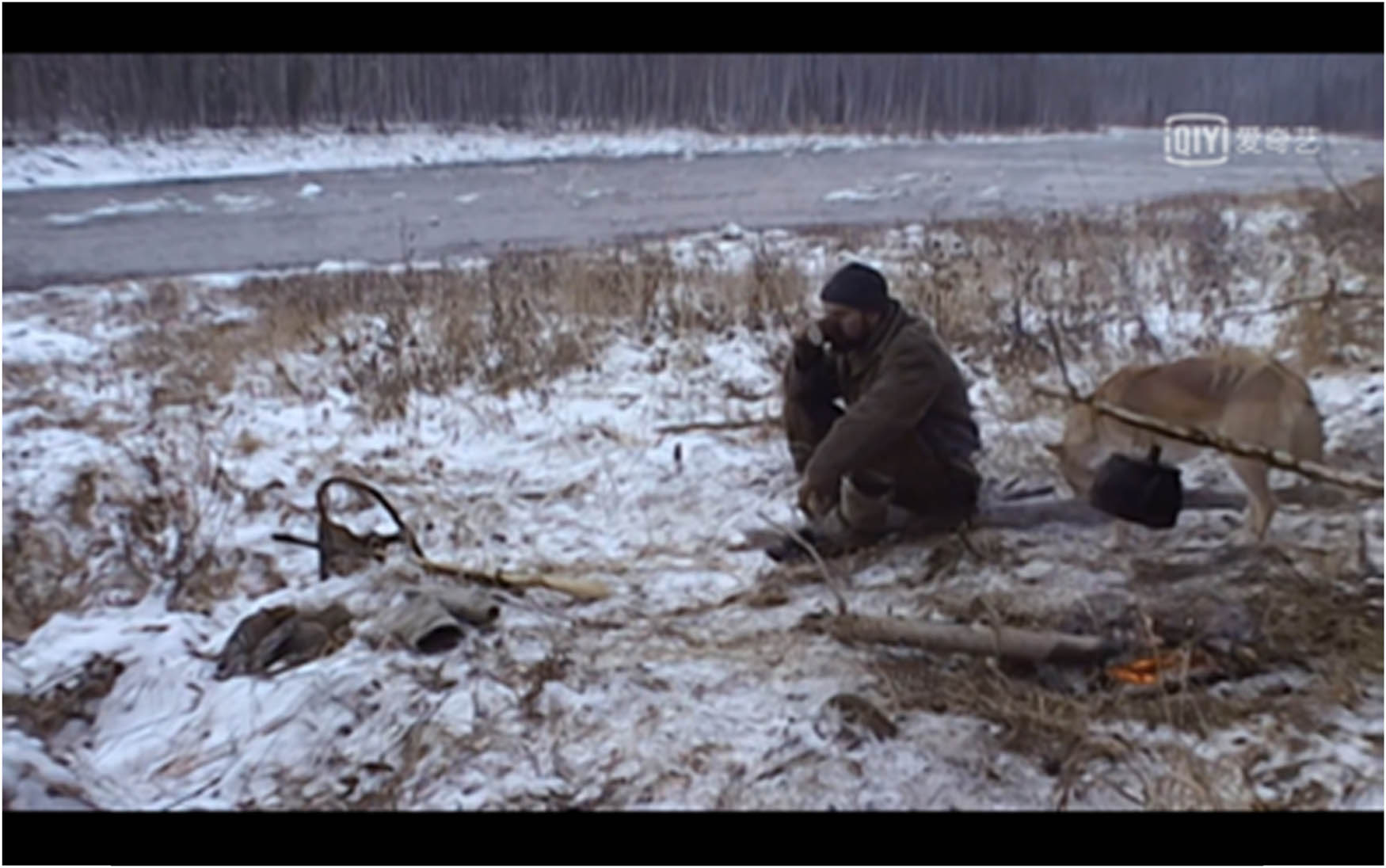 Figure 22
A hunter with his dog in a wintry scenery.