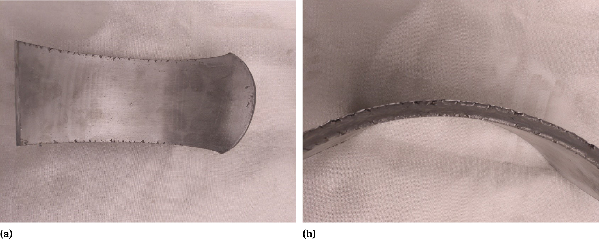 Figure 6 View of the third billet after rolling: a - from above; b - on the side