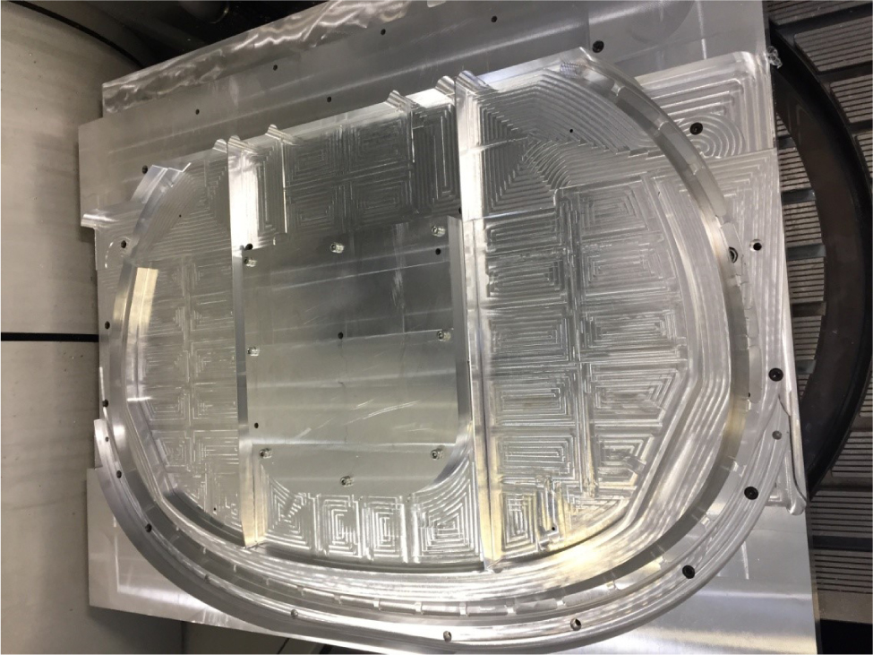 Figure 2 The frame mounting by technological bases and additional holes during the pocket machining
