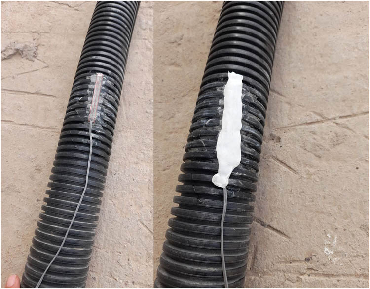 Figure 4 
               Strain gauge glued on the outside of corrugated pipe.
            
