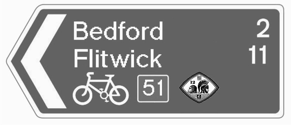 Figure 11 ECN route sign – This standard route sign is used across the UK to signpost cycle routes; it has been modified to illustrate how the geoarchaeological trail routing would be shown if it were adopted by the National Cycle Network