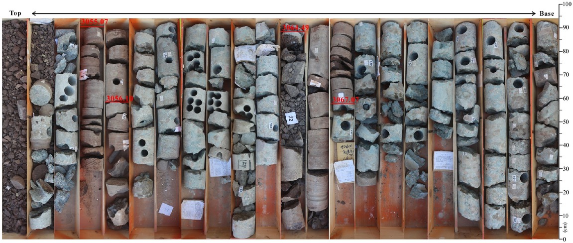 Figure 8 The photos of cores in the interval from 3053 to 3078 m, Well M154 in Figure 7. The conglomerates are greyish-green gravels, which include lots of igneous rocks. The color of siltstones and sandstones, 3067.07 to 3064.49 m and 3056.1 to 3055.07 m, is reddish-brown.