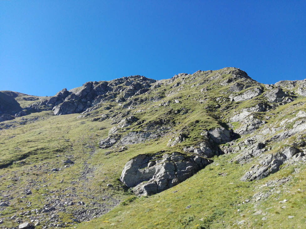 Figure 7 
                  Photographs from the field indicating susceptible areas due to great terrain slope, absence of forests, and presence of bare and loose soil (Photo: U. Durlević).
               