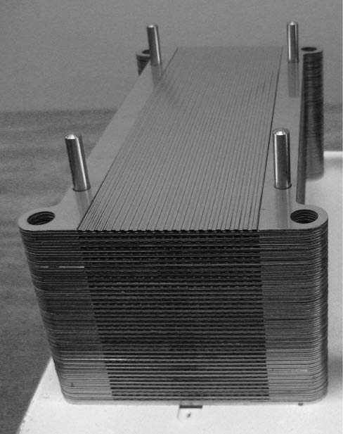 Figure 12 Stacking of a reaction module (first version) at IMM. View on the reaction side with still uncovered channels.