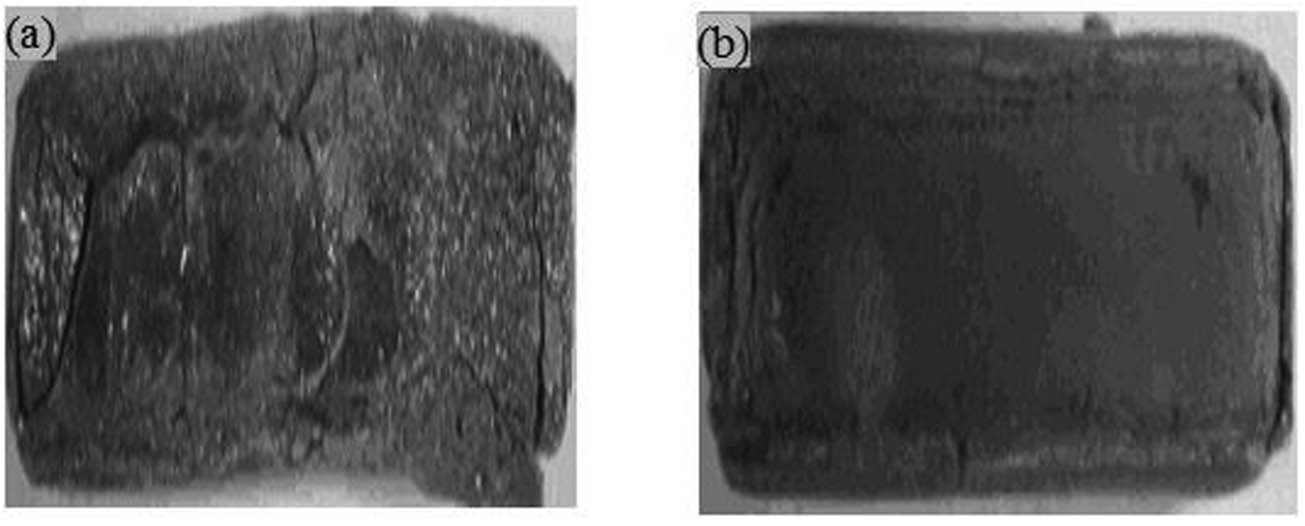 Figure 1 Macrographs of different regions of SMAW weldment in GrA1 steel subjected to high-temperature corrosion in Na2SO4–60% V2O5 at 900°C for 50 cycles: (a) weld metal and (b) HAZ.