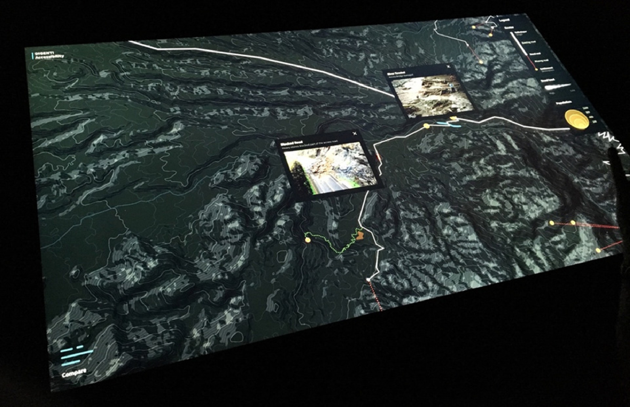 Figure 18 
              Tabletop showing updates from the field. New reports are updated in real-time and updated in all devices.
            