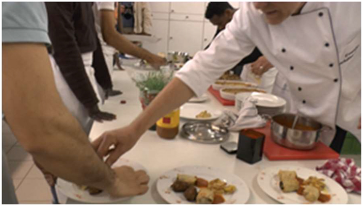 Figure 8: 
FR adjusts items on plate.
