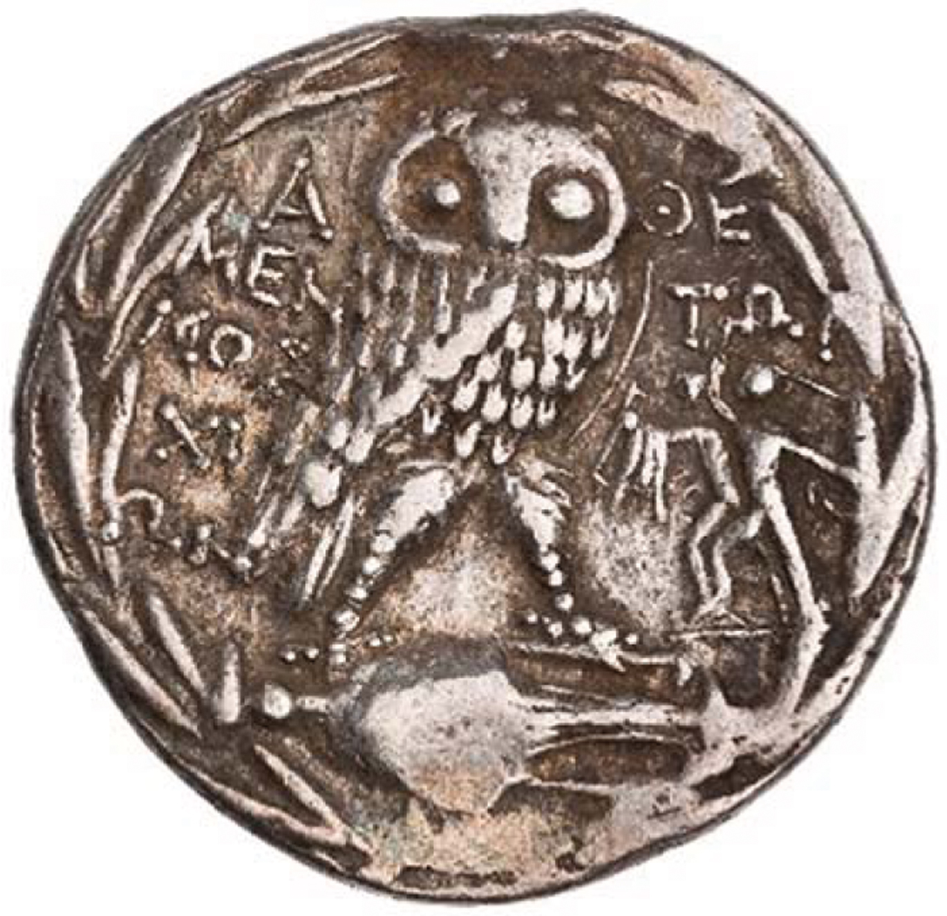Fig. 2 Reverse of Athenian tetradrachm (84–83 BCE), with a representation of the Harmodius and Aristogeiton statue in the right field. Reproduced with permission of American Numismatic Society.