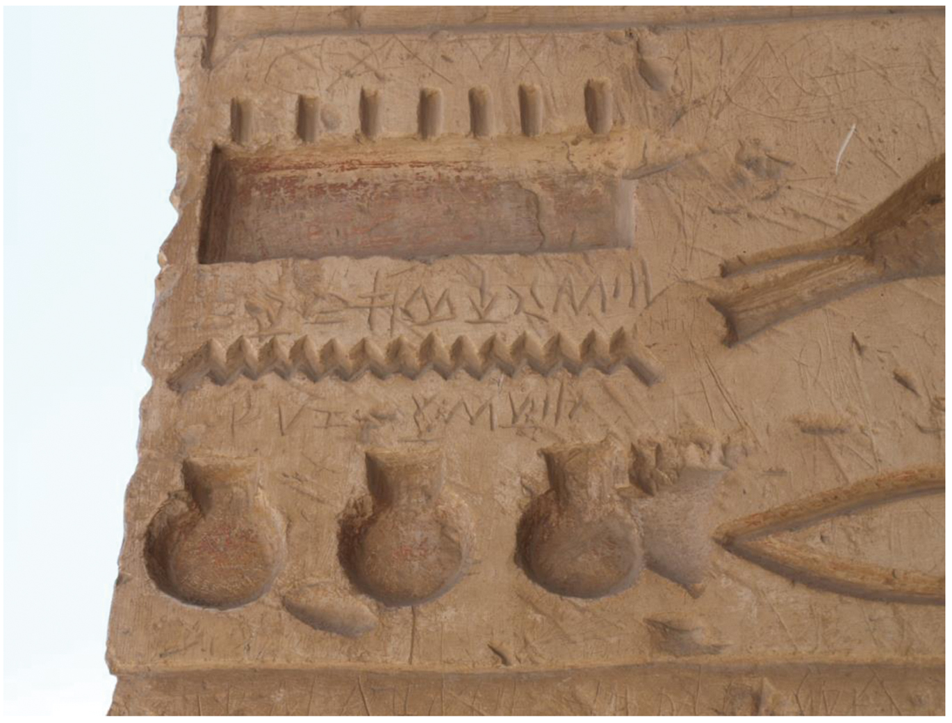 Fig. 5
Graffito engraved on the temple of Seti I (Abydos); Egetmeyer (2010), vol. II, Egypt n°11 = ICS n°376: (1) e-u-ru-te-mi | pa-si-ni (2) •-la-u-o-•-we-sa-se, Ἐρύθεμι(ς) Πασι-..., ‘Eruthemis son of Pasi-...(?),’ @Creative Commons ISAW.
