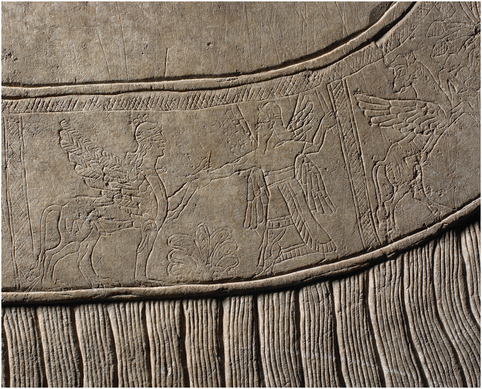 Figure 1:
A beardless lamassu grasped by a winged protective genius on the royal garment’s border band, Room G, North-West Palace, Nimrud (BM 124567, © The Trustees of the British Museum. All rights reserved).