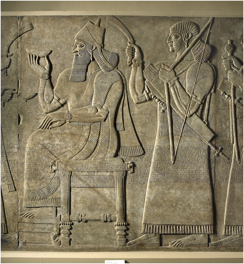 Figure 2:
Assurnaṣirpal II sitting with a bowl of wine among attendants, Room G, North-West Palace, Nimrud (BM 124565, © The Trustees of the British Museum. All rights reserved).