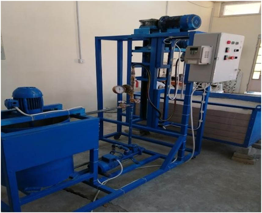 Plate 1 
               Side view of the low-pressure injection laboratory setup.
            