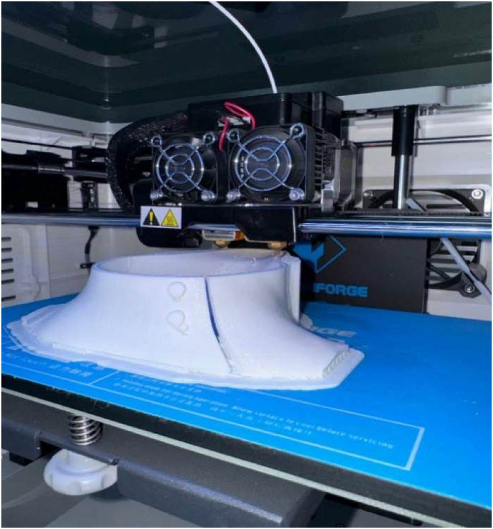 Figure 14 
                  3D printing of a prototype in Flashforge Guider II printer.
               