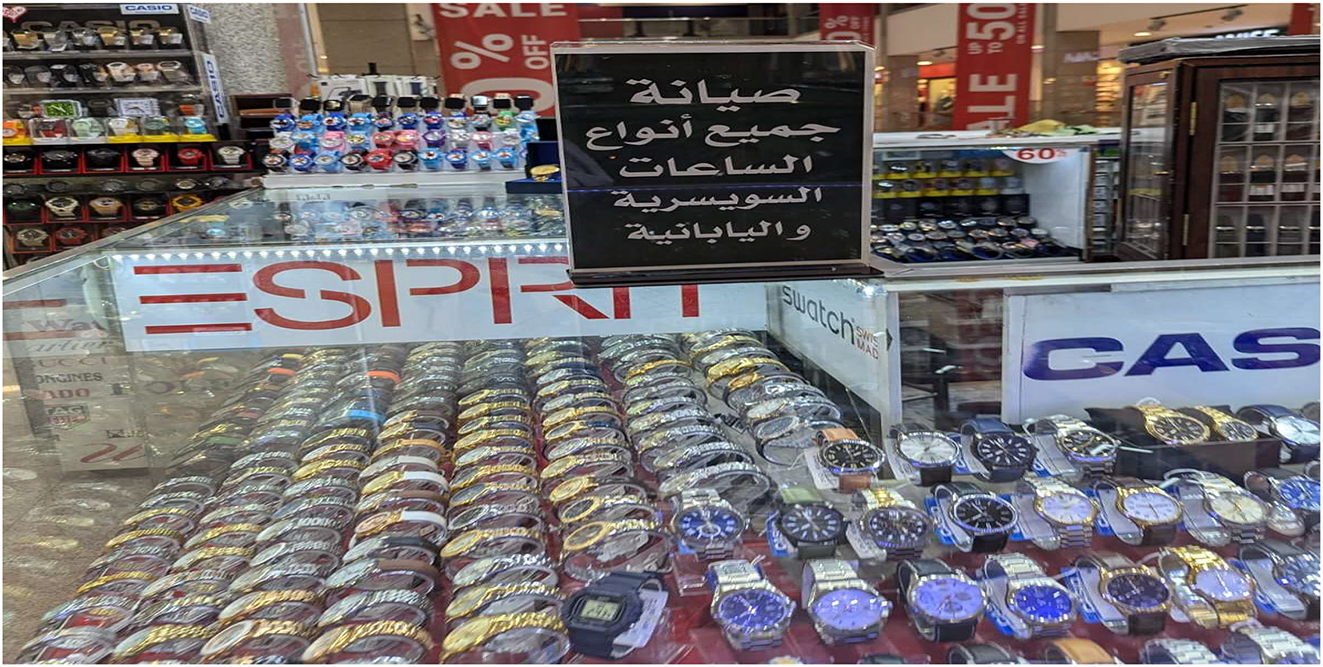 Picture 1: 
Written signs in storefronts.
