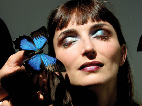 Figure 13 Photograph of a model wearing pigment-free photonic cosmetics inspired by structural colour in Lepidoptera. (Image courtesy of L’Oreal.)