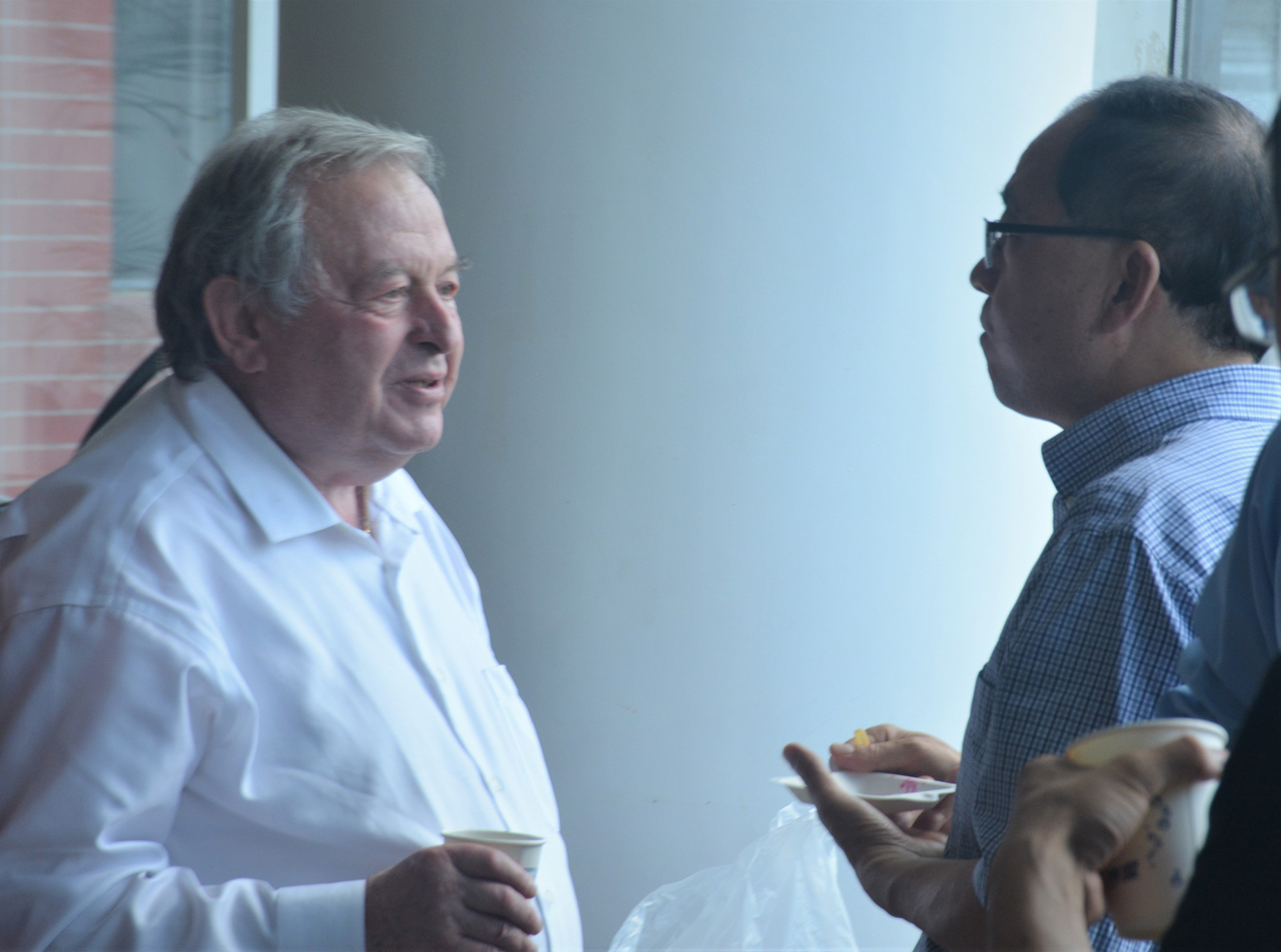 Figure 3: 
Mark Stockman and I were having a conversation during our last meeting at Tsinghua University on July 12, 2019.
