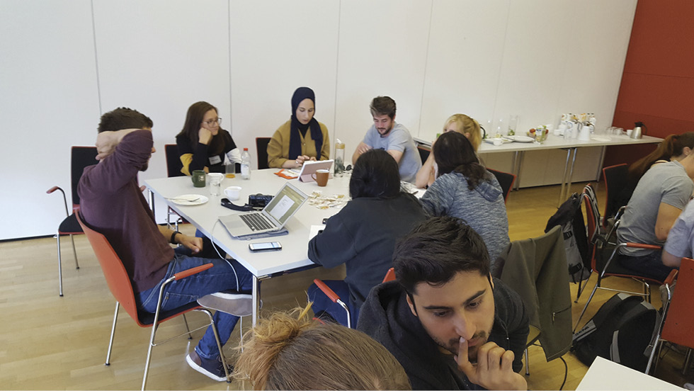Fig. 7 Intense discussions and brain storming