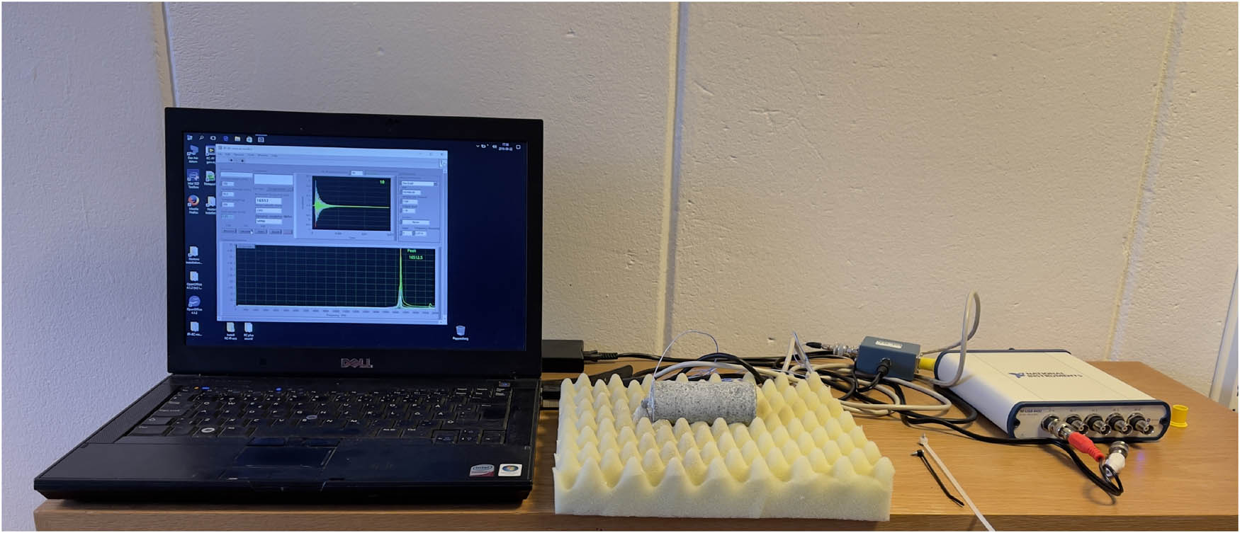 Figure 2 
                  A process of seismic measurements which evaluates P-wave velocity of the specimen. Photo source: Per Lindh.
               