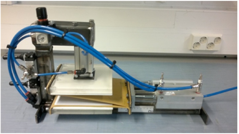 Figure 1 The device for in-plane compaction of paper sheets at VTT (Khakalo et al. 2017).