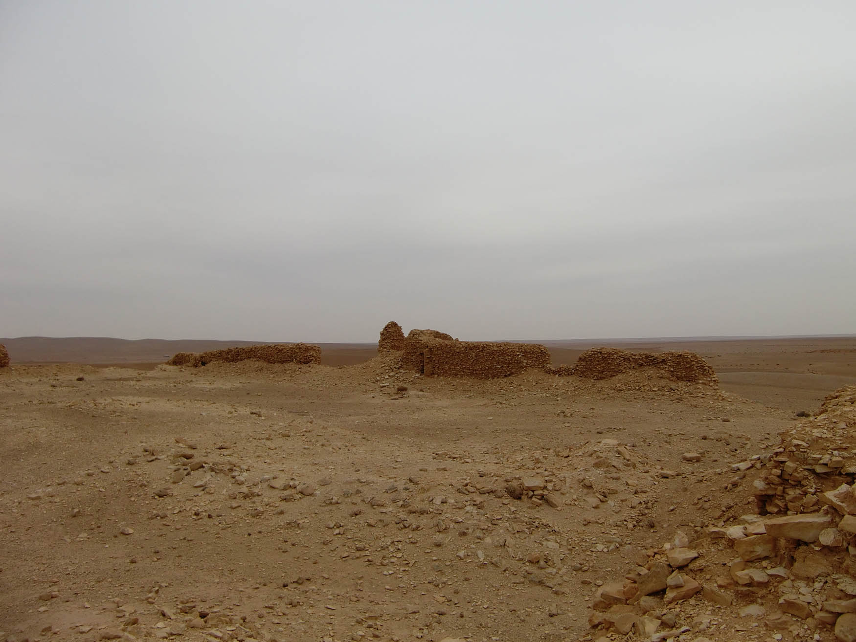 Figure 13
Khan al-Manqura, courtyard, facing S with view across the valley and towards the plain. Photo: Jørgen Christian Meyer.