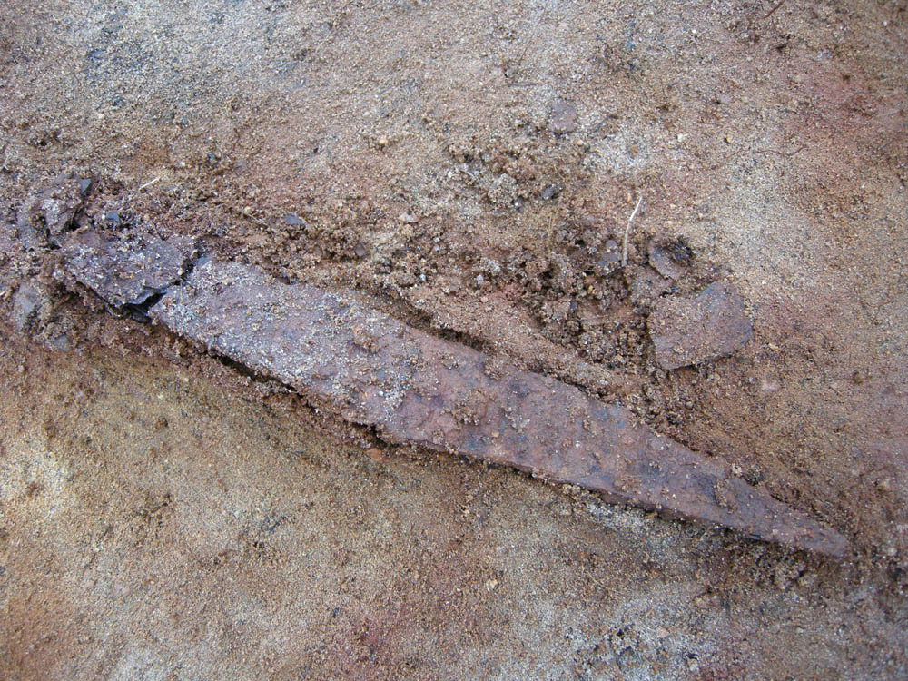 Figure 8
Knife composed of multiple layers of phosphoric iron and low-carbon steel, resembling pattern welding techniques commonly used in the Late Iron Age, found at the Sangis smithing site in northern Sweden (photograph by Staffan Nygren © Norrbottens museum).