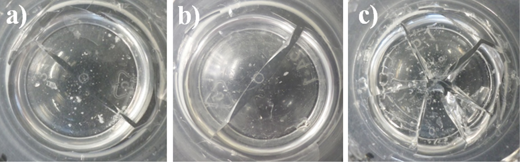 Fig. 2: 
							Top view of the xerogels obtained from 2hDGA sol (a), 2hTUDA sol (from [14]) (b), and 2hPEGBA sol (c).
						