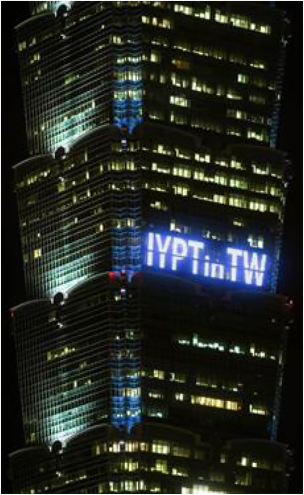 Fig. 12: 
A close-up photo in showing the text “IYPT in TW” on Taipei 101.
