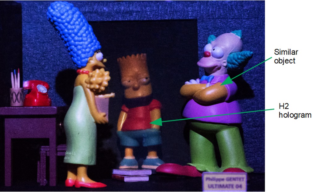 Figure 8 Diorama with real objects and the H2 hologram