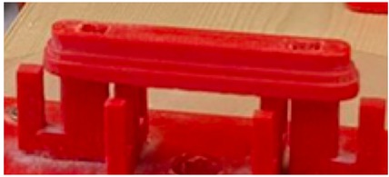 Figure 5 Plastic support defining the position of the tuns of a layer.
