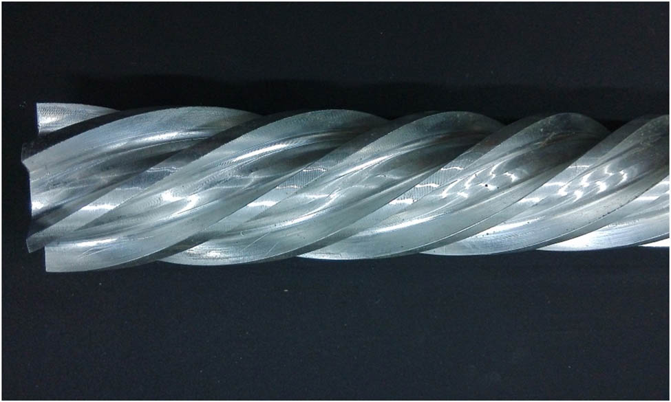 Figure 4 
               Picture of multi-start helical channel component.
            