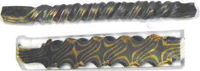 Figure 1 Twisted bar; overall view and longitudinal section with torsion pattern.Bild 1: Verdrehter Stab Gesamtansicht und Längsschnitt mit Torsionsmuster.