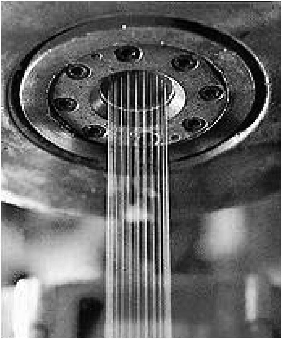 Figure 4: Spinning of viscose fibers through a spinneret, reprinted with permission from Ref. [2]. Copyright (2012) Elsevier.