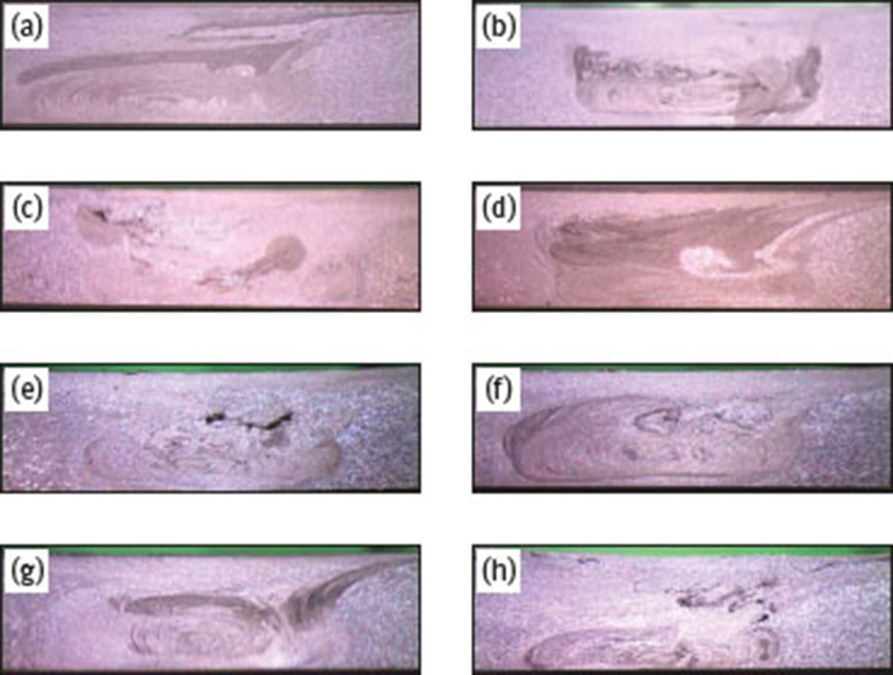 Fig. 5 Optical stereoscopy macrographs of the cross sections of the specimens after etching. Test: (a) 1, (b) 2, (c) 3, (d) 4, (e) 5, (f) 6, (g) 7, (h) 8.