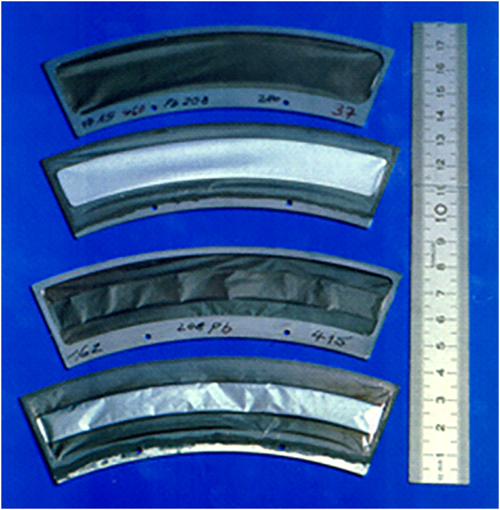 Figure 12: 

208Pb-targets on carbon backings for SHIP showing the backing side (1 and 3 from above) and the target side (2 and 4 from above), respectively, with an enlarged target area and improved backing quality (upper two) compared to the previous target version (lower two) [135]. (Reprinted from B. Lommel et al., Nucl. Instrum. Meth. A 480, 16–21 (2002), “Improvement of the target durability for heavy-element production”, https://doi.org/10.1016/S0168-9002(01)02041-1, © 2002, with permission from Elsevier.).
