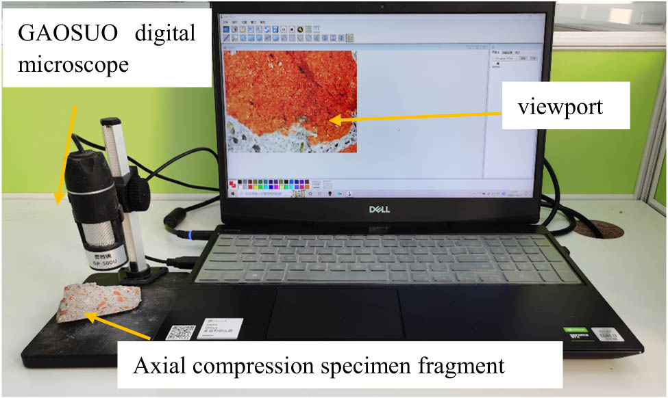 Figure 3 
                     Microobservation equipment for failure section of axial compression specimen.
                  