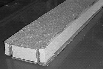 Figure 13: A lay-up of flax mat and foam before bagging [30].