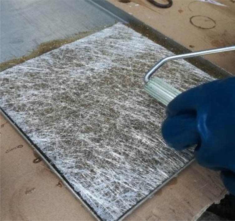 Figure 2
Manual production of polyester–glass composite.