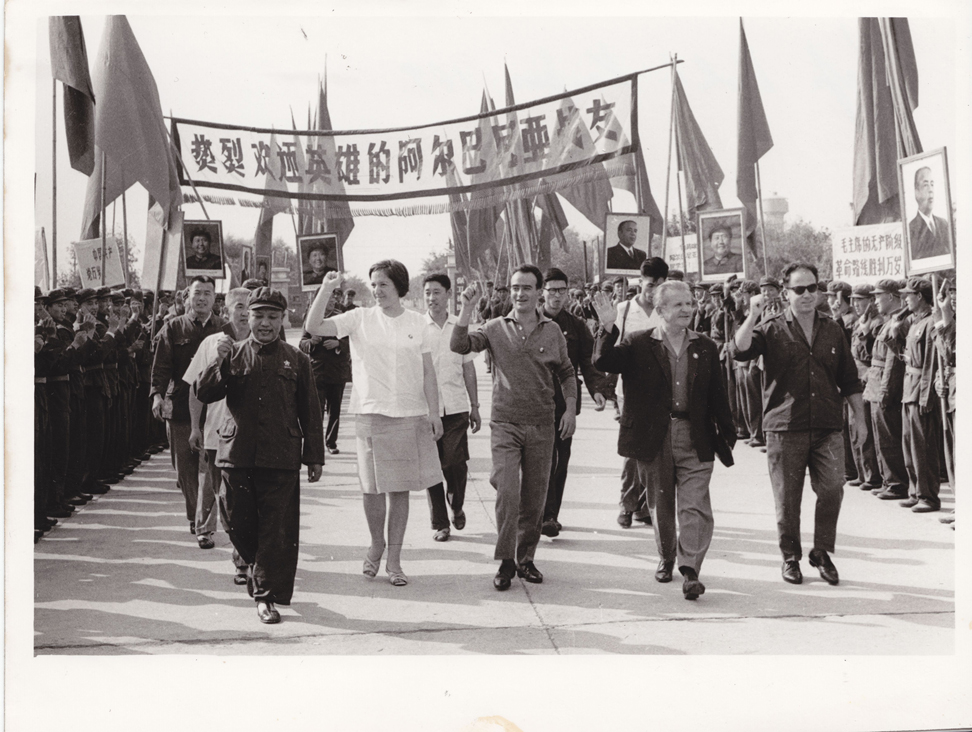 Figure 6: 
A delegation of Albanian photographers receives honours in China, in 1970. Courtesy: Private collection, Tirana. From left to right: Katjusha Kumi, Pleurat Sulo, Jani Ristani, and Refik Veseli spent several months in China where they were trained in various photographic techniques. They also visited the country and were offered cameras for their personal use as tourists.