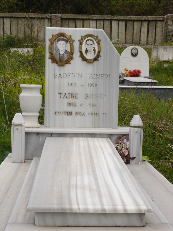 Figure 9: 
Gravestone in Fushëbardhë. Courtesy: Gilles de Rapper, 2010. The portrait in Figure 8, here printed on porcelain, is recognisable. We learn that this woman was 26 years old at the time the photograph was taken and, presumably, that no other portrait of her was made before her death in 1958.